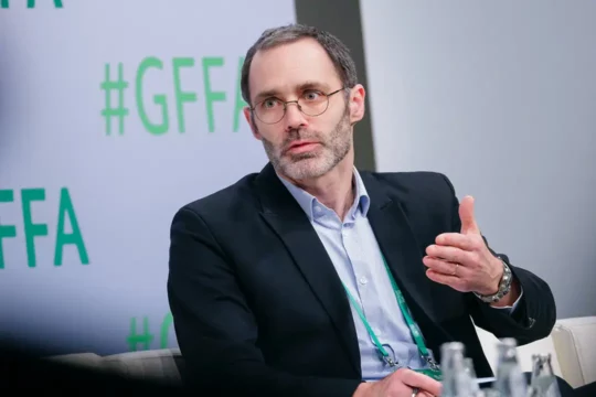 Dionys Forster speaking at an event